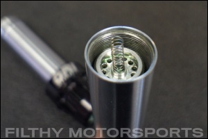 Closeup photo of an ORI STX Strut rebound piston inside the shaft cylinder