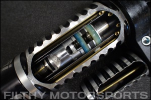 Closeup cutaway photo of an ORI STX Strut with the internals visoble