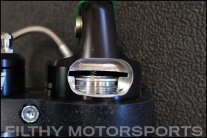 Closeup size view cutaway photo of an ORI STX Strut valving disc within the top cap