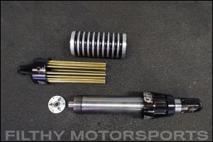 Photo of an ORI STX Strut disassembled into its 3 major components